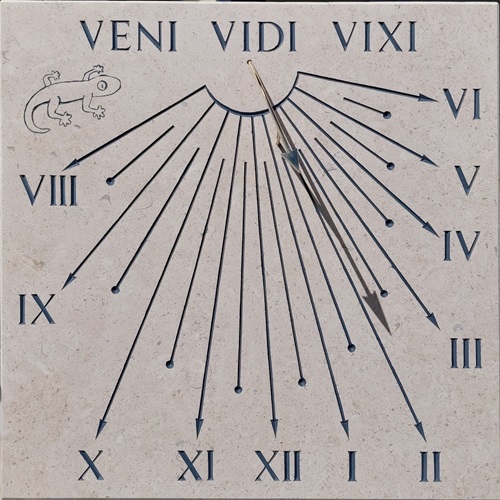 Réalisation d’un cadran solaire en pierre, avec devise et chiffres Romain.